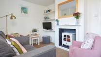 The cosy sitting-room is charming.