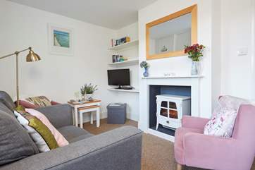 The cosy sitting room is charming.