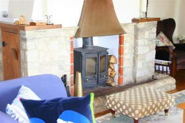 The wood-burner in sitting-room.