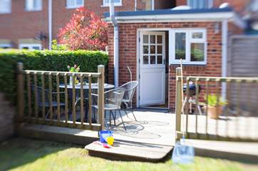 A perfect place for a BBQ in this sun trap. (The BBQ is charcoal).