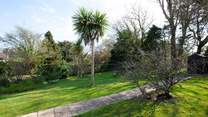 The large mature garden has plenty of room to run around.