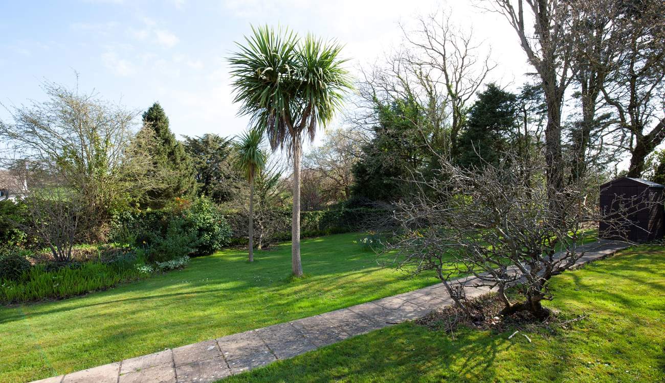 The large mature garden has plenty of room to run around.