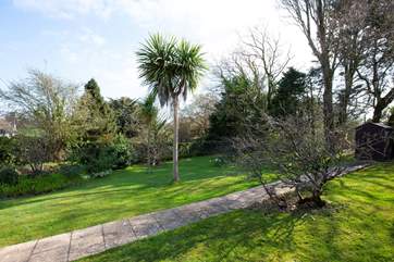 The large mature garden has plenty of room to run around.