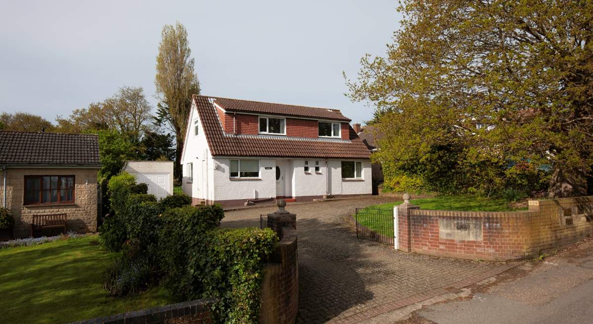 The house is located in a quiet residential lane with ample parking.