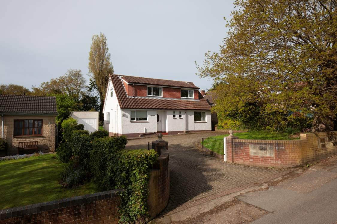 The house is located in a quiet residential lane with ample parking.