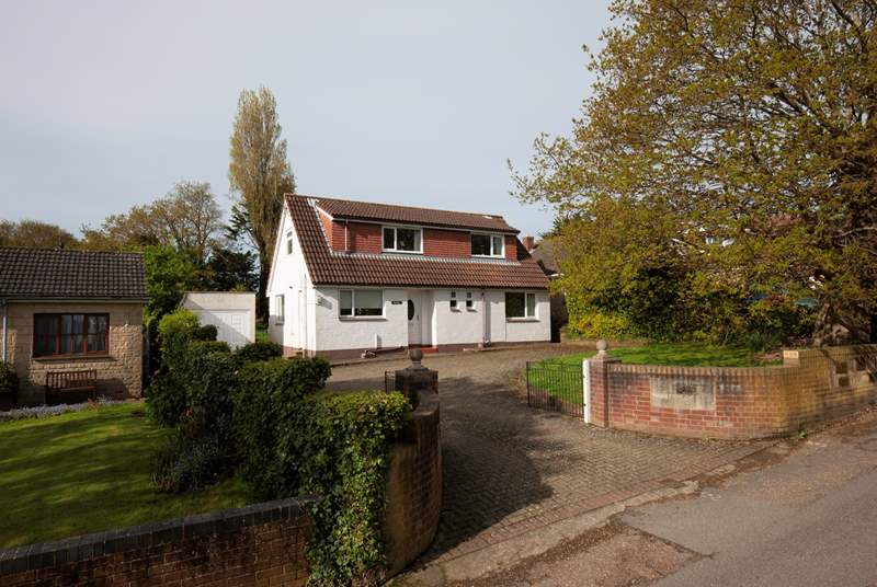 The house is located in a quiet residential lane with ample parking.