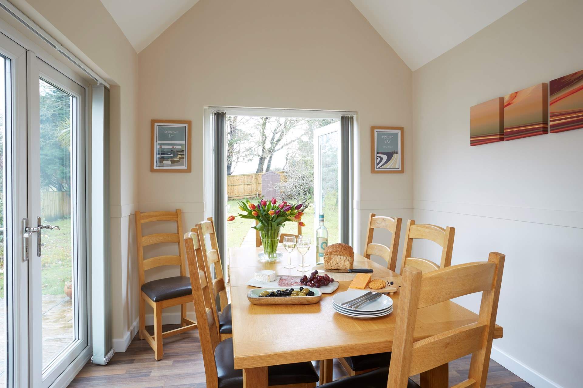 The bright dining-room has dual aspect windows and lots of natural light.