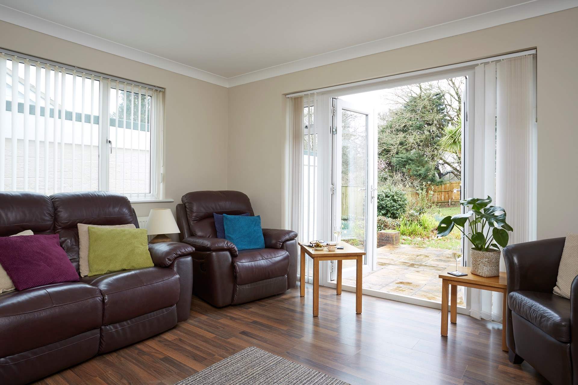 The sitting-room looks out onto the garden.