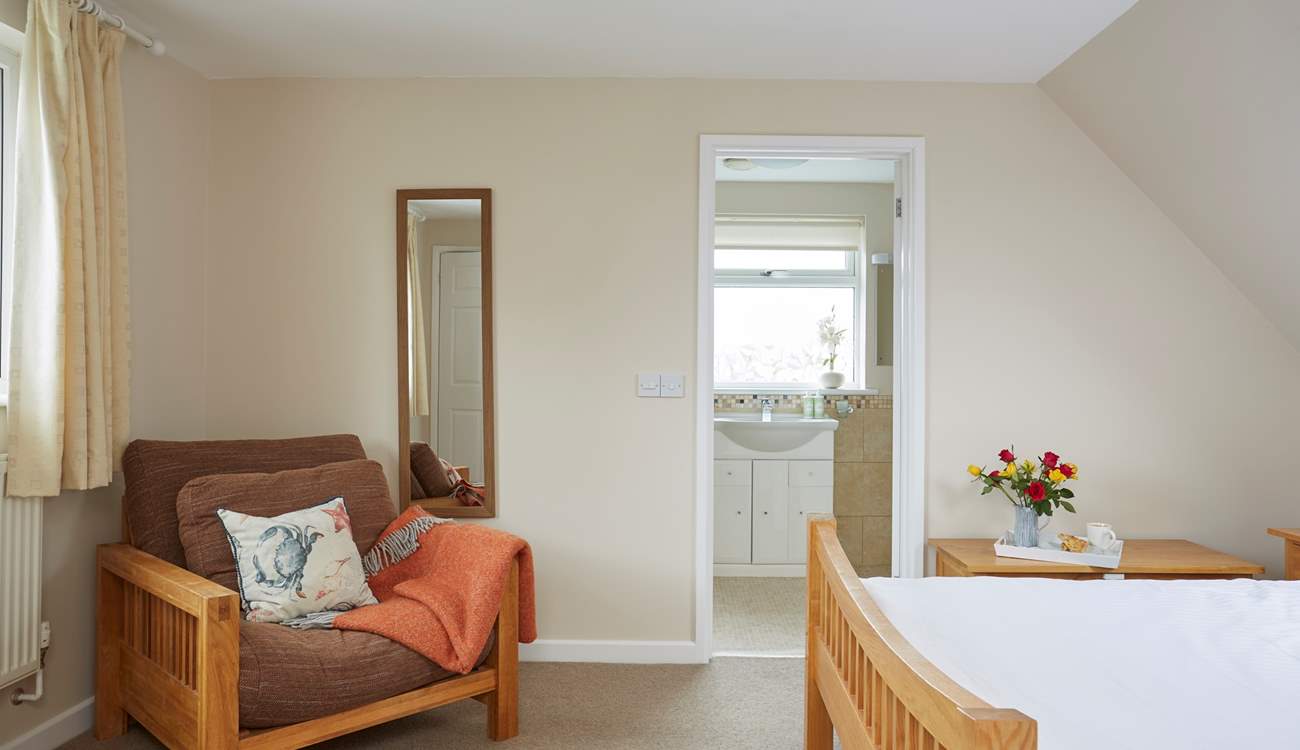 The master bedroom with en suite bathroom.