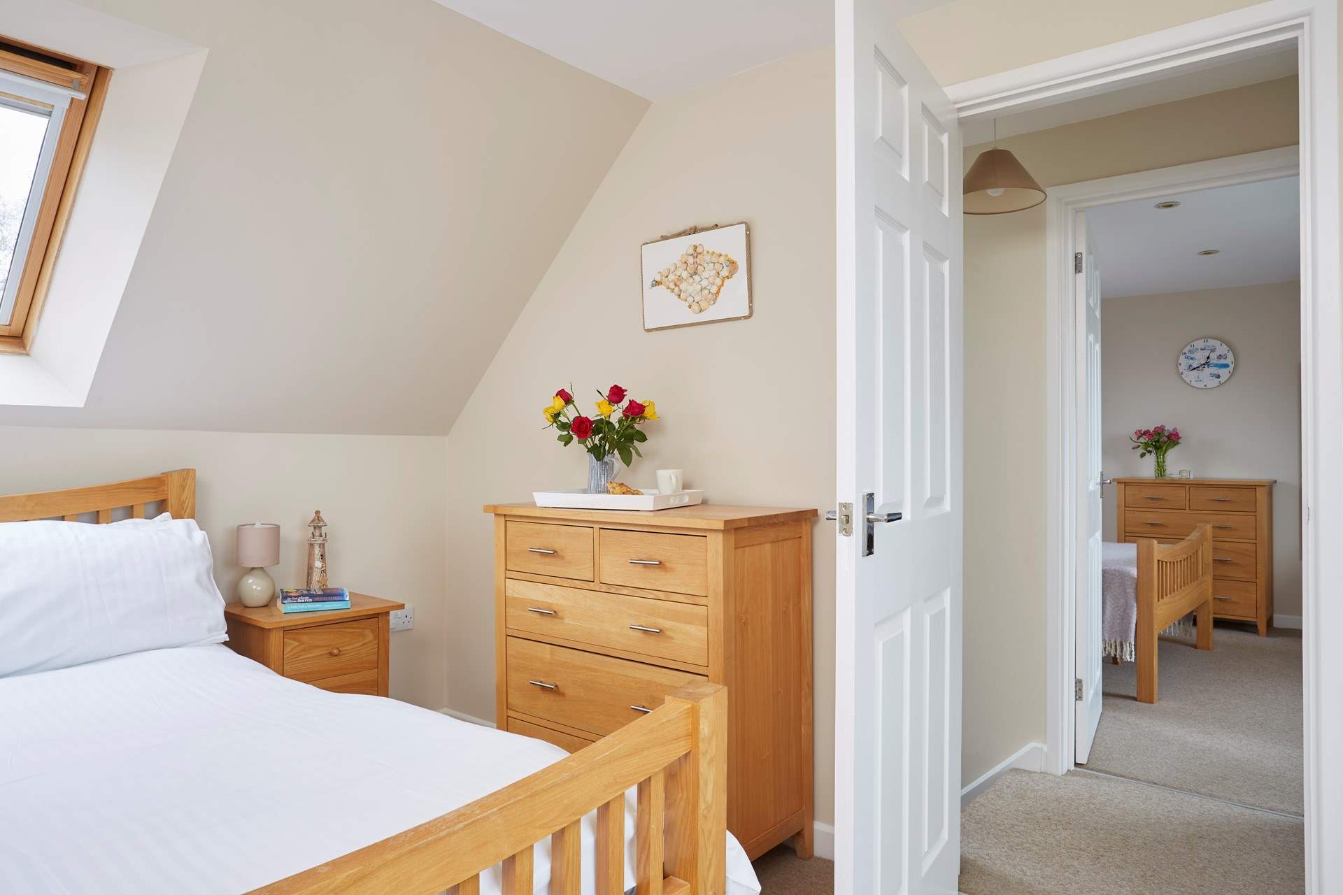 View from the master bedroom through to the second double bedroom.