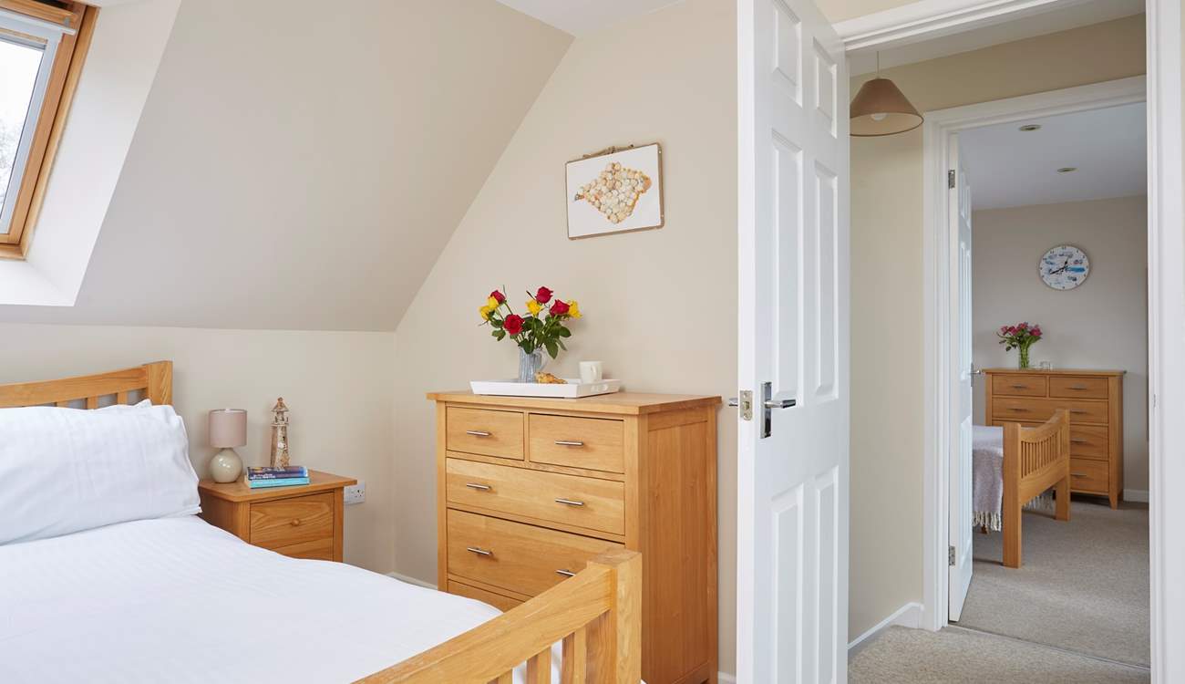 View from the master bedroom through to the second double bedroom.