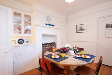 The cheerful dining-room seats up to six.