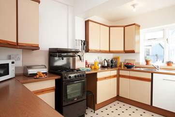 The bright, well-equipped kitchen to the rear of the property.