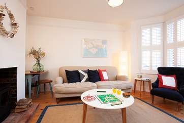 The sitting-room is both bright and spacious.