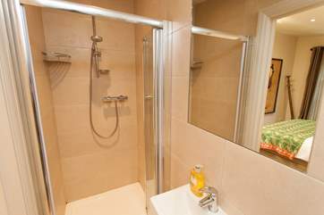 The en suite off the master bedroom has a shower to wash away the sand from in between your toes.