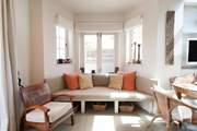 As well as the modern and comfy window seat, there is also a sofa in the living-room for ultimate comfort.