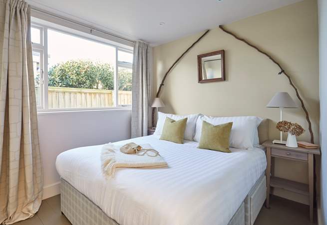 Bedroom 2 with comfy king-size bed.