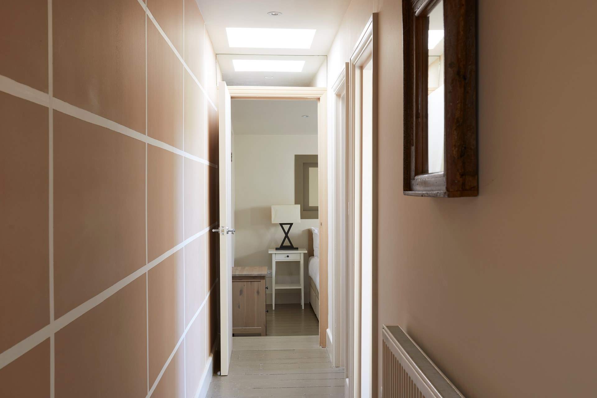 The corridor leads to the cosy bedrooms.