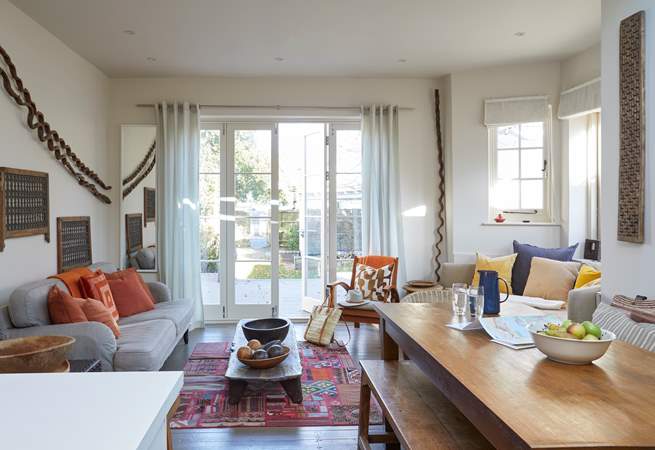 On a warm day, open up the patio doors from the living-room out to the lovely garden.