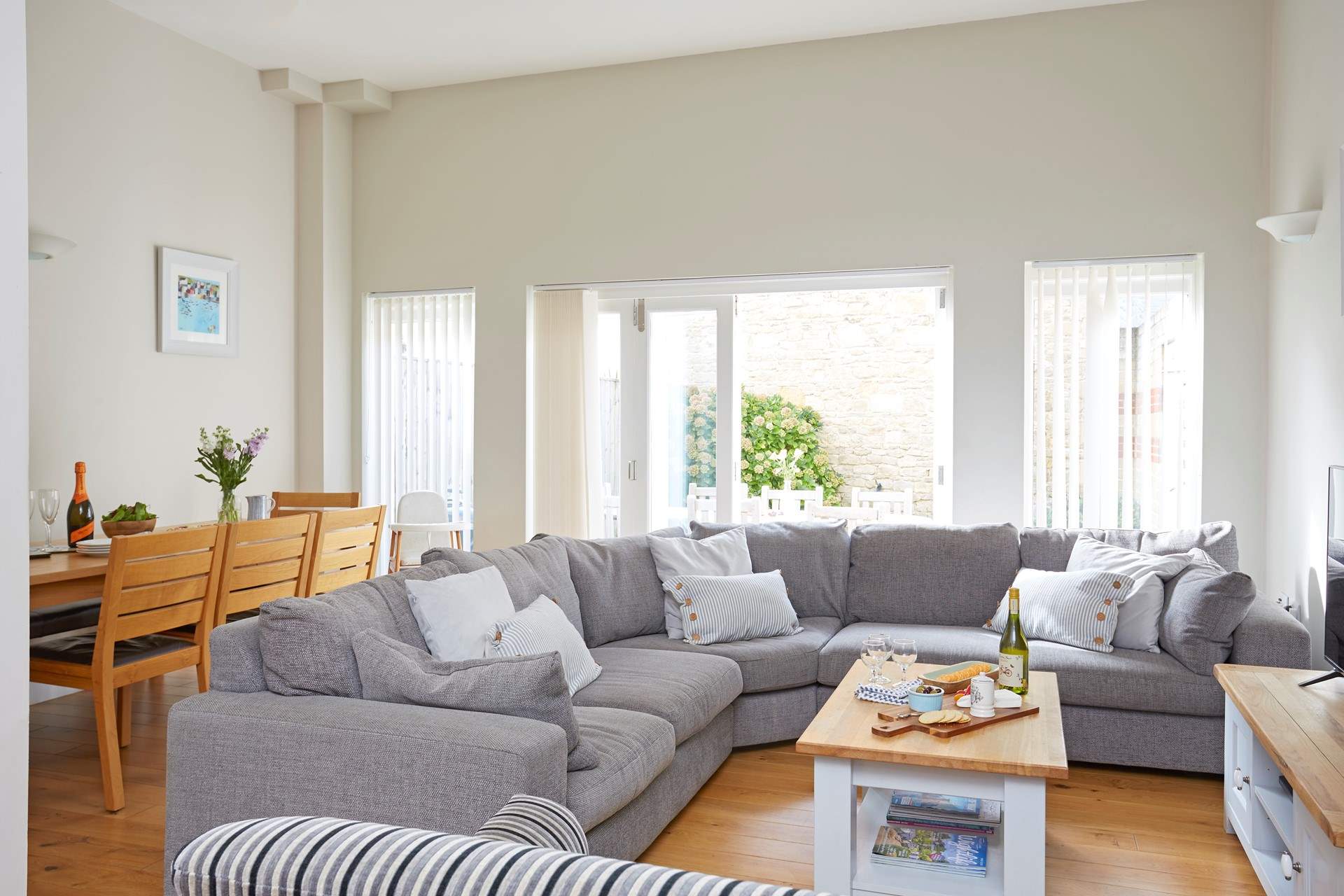 Large open plan living-room and dining area is the perfect set up for a family gathering.