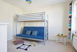 The second floor bunk room. Please note the bottom bunk bed is a futon pull out bed, and suitable for children only.