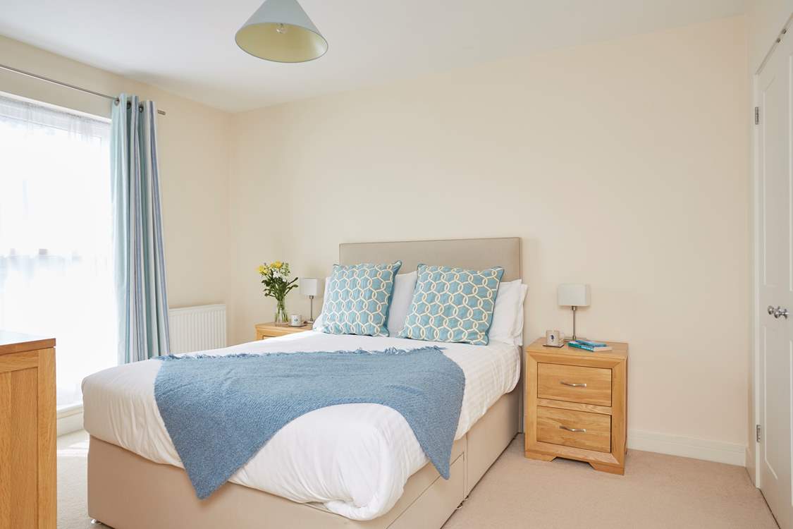 The attractive second floor double bedroom faces the back of the property.