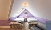 There are two twin bedrooms on the second floor.  - Thumbnail Image