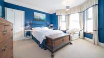 The spacious main bedroom is on the first floor. 
