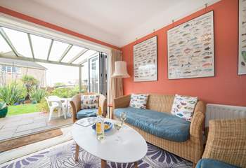 There are two sets of bi-folding doors leading out to the patio area.