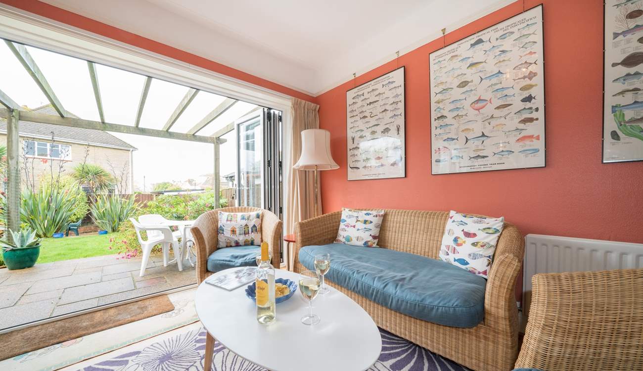 There are two sets of bi-folding doors leading out to the patio area.