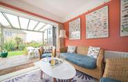There are two sets of bi-folding doors leading out to the patio area.