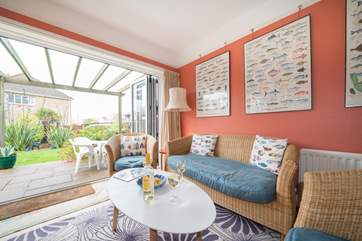 There are two sets of bi-folding doors leading out to the patio area.