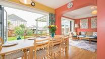 The open plan living-room with kitchen and dining areas.