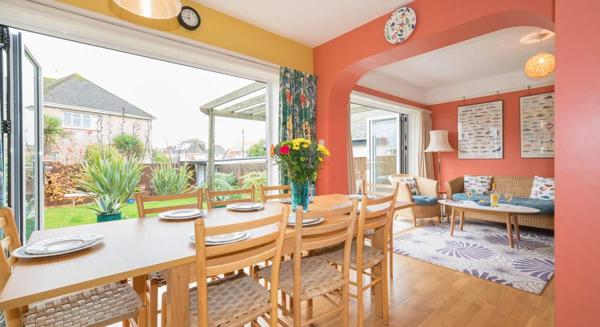 The open plan living-room with kitchen and dining areas.