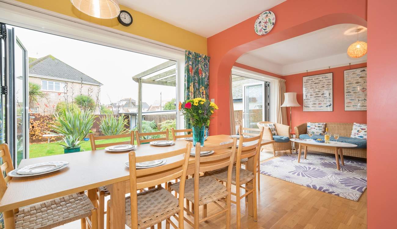 The open plan living-room with kitchen and dining areas.