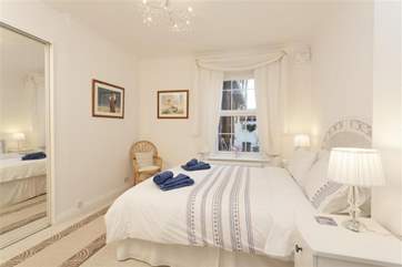 The double bedroom has a luxurious king-size bed.