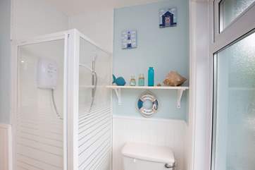 The white suite is modern and inviting.