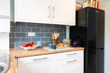 The kitchen offers a nicely designed space for cooking holiday meals.