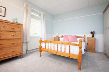 The master bedroom boasts impressive views out to the sea.