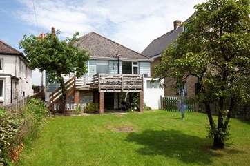 Enjoy a green and pleasant view from the back of the cottage.