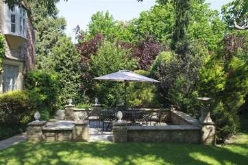 The shaded patio is the ideal spot for al fresco dining.