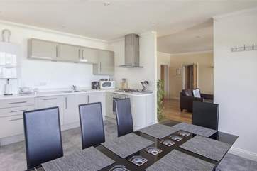 Kitchen/dining-room through to sitting-room.