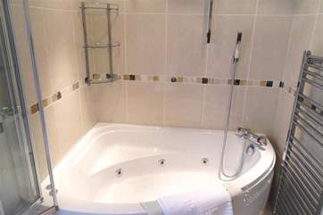Bathroom with spa bath.