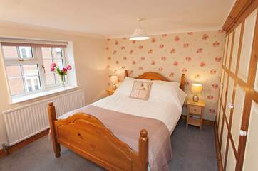 Feel cosy in this lovely and comfortable master bedroom.