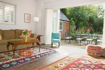 Lounge with bi-fold door onto patio