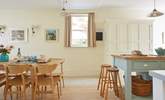 Light and airy kitchen with stylish dining-table and chairs. - Thumbnail Image