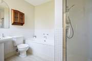 The en suite bathroom with separate shower and bath to the family bedroom.