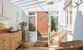 The sun-room is ideal to hang your beach towels on the pegs or read a good book in the sun. - Thumbnail Image