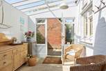 The Garden-room ideal to hang your beach towels on the pegs or read a good book in the sun.