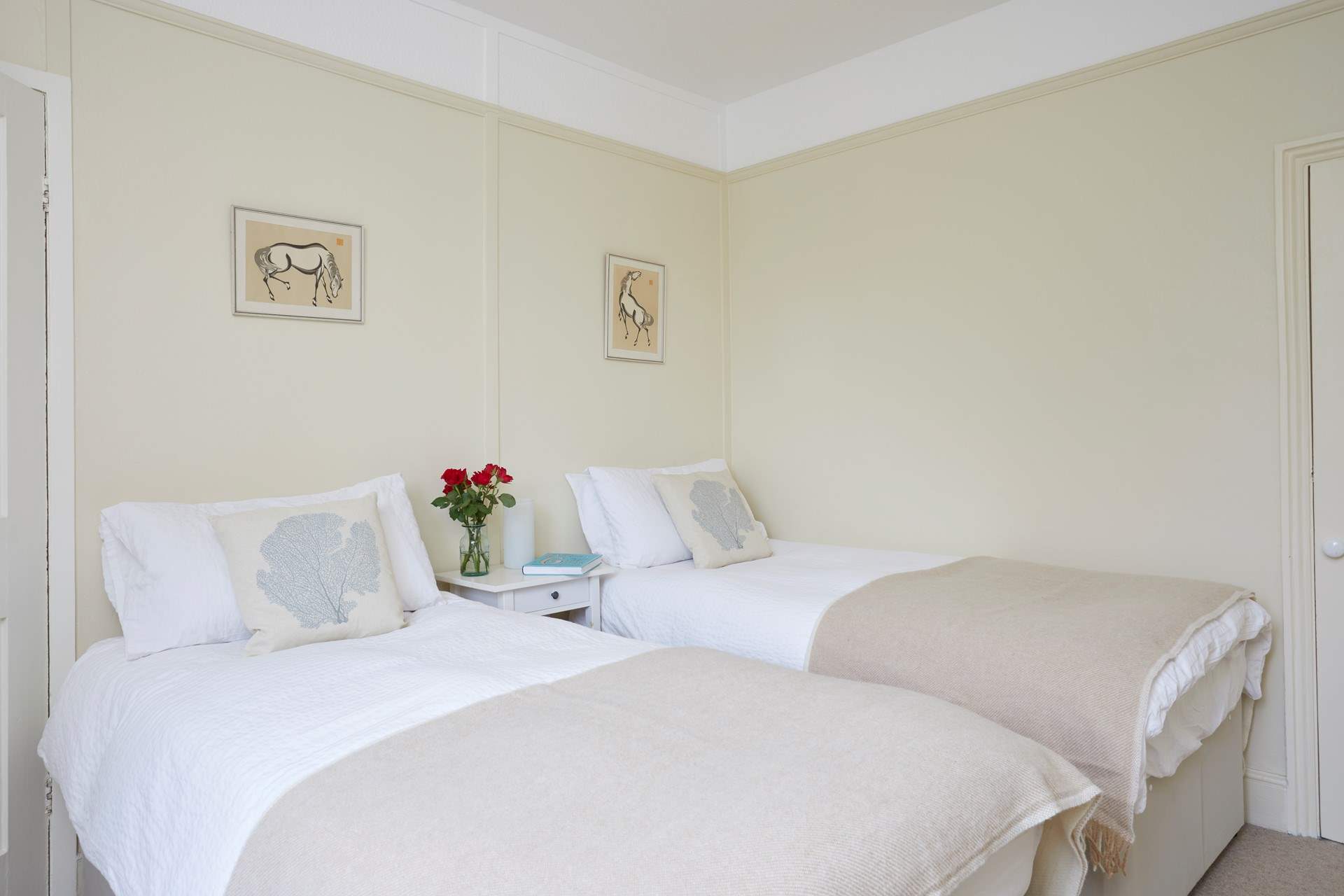 The pretty twin bedroom.